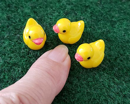 tiny resin yellow duck     set of 4                       yellow ducks