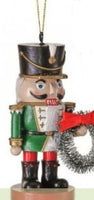austrian nutcracker holiday ornaments    rg0763556 1) rg0763556-g   green with wreath and tophat