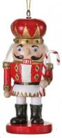 austrian nutcracker holiday ornaments    rg0763556 2) rg0763556-r   red with candy cane and round crown hat