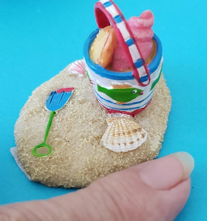 mini beach pail in sand                                  sd-me189