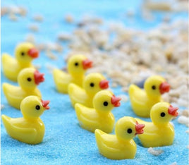 tiny resin yellow duck     set of 4                       yellow ducks